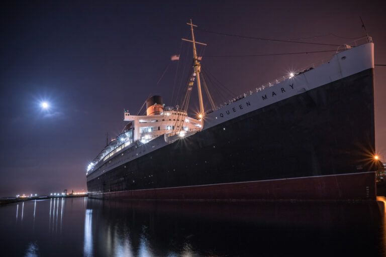 RMS Queen Mary at night, docked in Long Beach, California